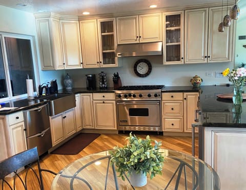 Kitchen with gas stove, double dishwasher, warming oven, wine cooler, etc.