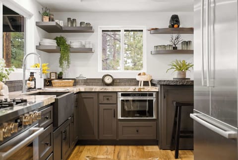 Luxury kitchen with Bosch stainless steel appliances.