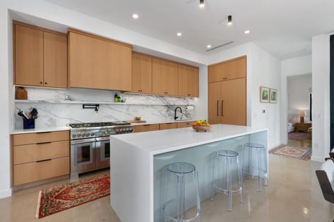 Kitchen with Bar dining, and Thermador Appliances