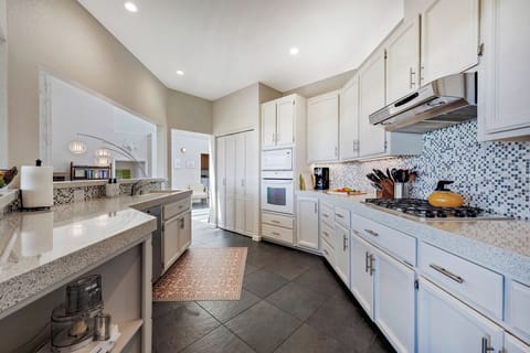 The kitchen is a chef's delight with plenty of counter space.