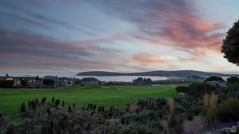 Sunset view of the Pacific Ocean, Doran Beach and Bodega Head.