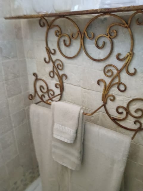 Shower, jetted tub, hair dryer, towels