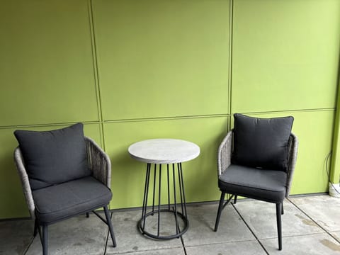 Bistro area on the back porch with built in heater in the ceiling