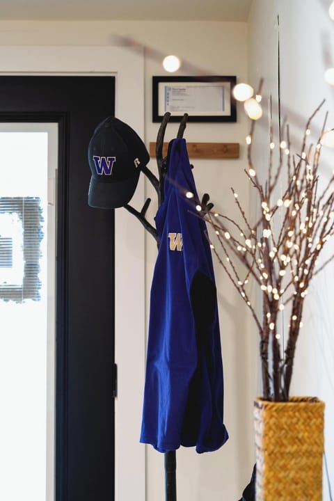 - Entryway decor with hooks and soft glowing lights  
- Organized spot to hang coats hats and personal items  
- Stylish detail adding warmth to the welcoming space  
