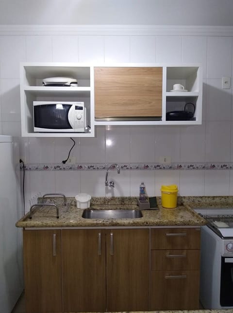 Fridge, microwave, oven, cookware/dishes/utensils