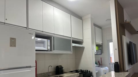 Fridge, microwave, oven, cookware/dishes/utensils