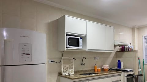 Fridge, microwave, oven, cookware/dishes/utensils