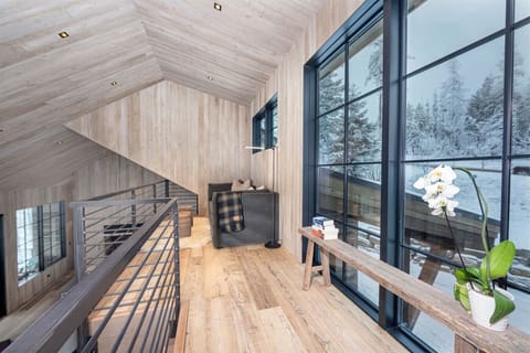 The loft is an additional living space positioned above the main living room of the home.