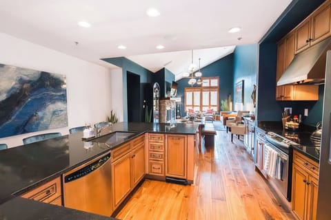 Grand:
Pitched ceilings make the space feel more open and inviting.