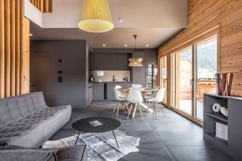 Living room, dining area and kitchen