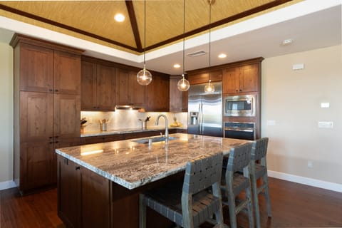 Open concept kitchen with seating at the island