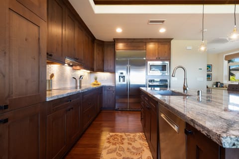 Gourmet kitchen with an assortment of spices, vinegar & Oil provided