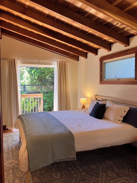 Bedroom with french doors open to back