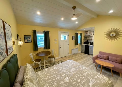 Cozy retreat with a Queen bed and table for two. 