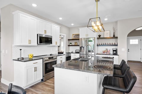 Open kitchen with elegant lighting
