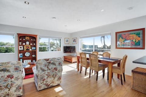 The dining table is part of the open plan living spaces.