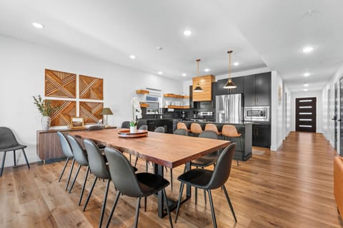 Dine in style at the live edge table after cooking up a storm in the modern kitchen! 