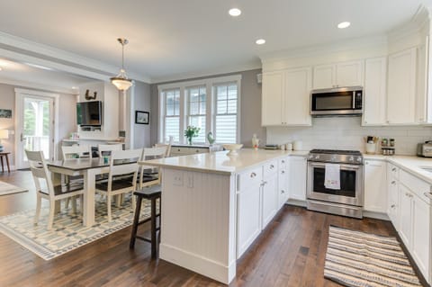 The kitchen is part of the open floor plan into the dining room seating.