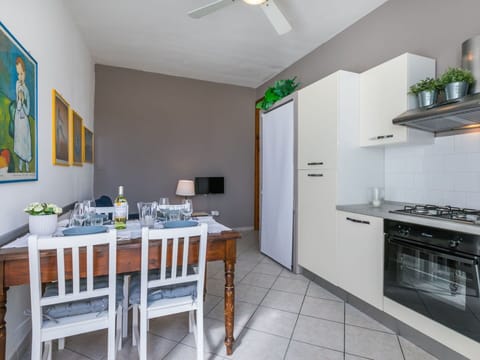 Furniture, Property, Ceiling Fan, Cabinetry, Table, Lighting, Countertop, Interior Design, Home Appliance, Kitchen Appliance