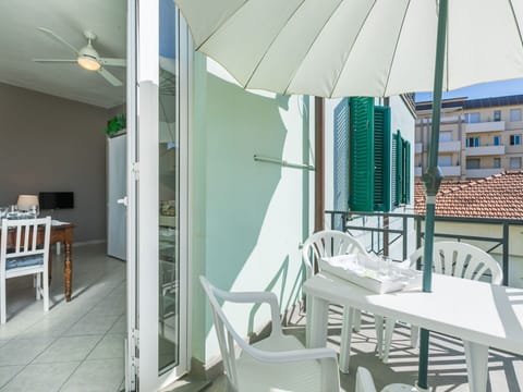 Furniture, Table, Building, Window, Chair, Shade, Lighting, Condominium, Urban Design, Flooring