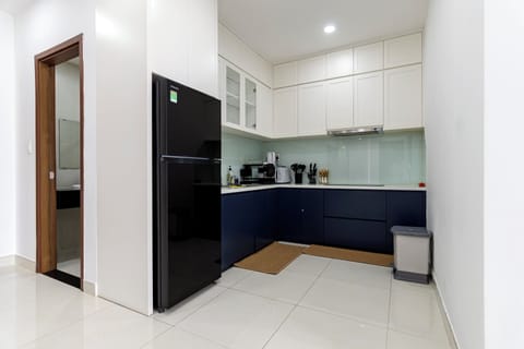 Fridge, microwave, highchair, dining tables