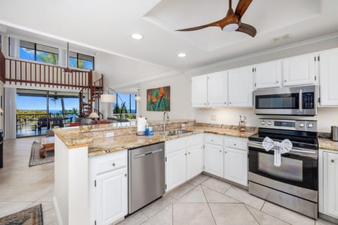 Kitchen w/ ocean view from entry - Open-concept kitchen with ocean view as soon as you walk in.