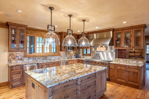 Fully appointed kitchen with 6 plus burner stove with griddle