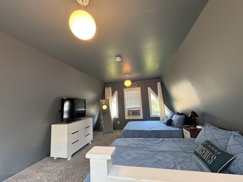 Sleeps 4 in two queen beds - please note ladder stairs!!