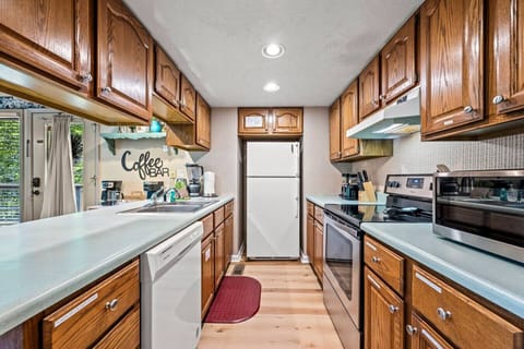 The fully-equipped kitchen includes all of the amenities that your group needs to enjoy a meal in or take-out from the local Gatlinburg restaurants.