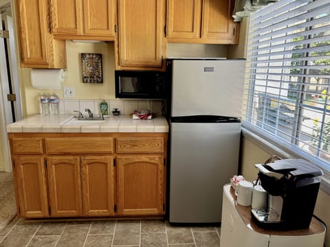 Fridge, microwave, coffee/tea maker, toaster