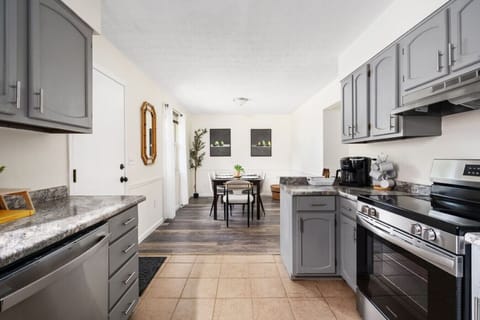 Fully Furnished Kitchen Open to Dining Area