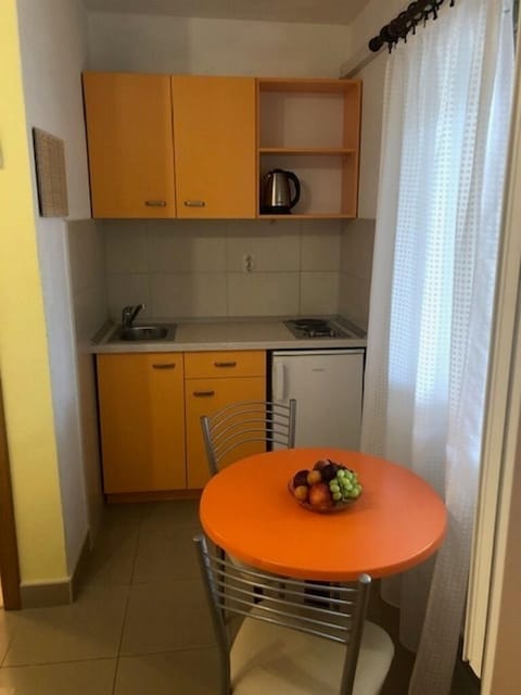 Fridge, stovetop, cookware/dishes/utensils