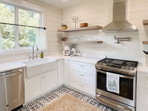 Kitchen is stocked with all the cooking supplies you need.