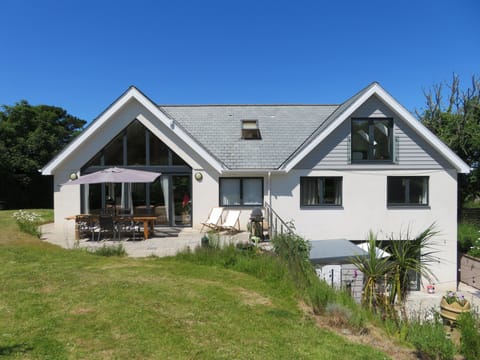 Rear view of house showing sun terrace and sunken garden