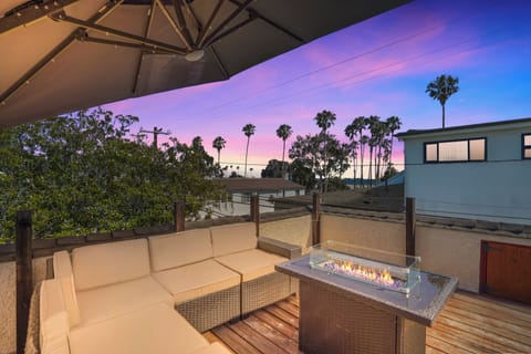 Beautiful 3rd Level Deck with String Lights, Fire Pit and Ocean View