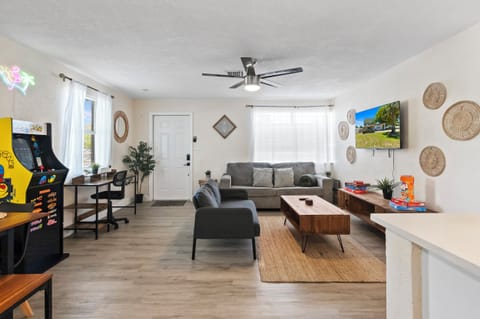 The spacious living room features two free-to-play arcade classics Pac-Man...