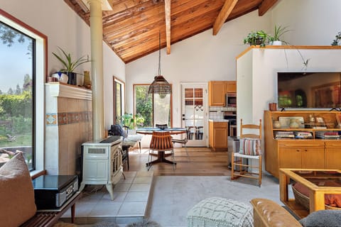 A nearly open floorplan from the entry and living area to the dining space and kitchen.
