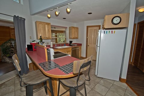 Full Kitchen with Bar Stools
