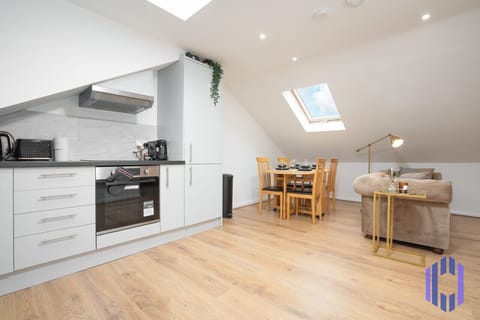 Kitchen. Fully equipped with cooking equipment perfect for families. Appliances such as fridge freezer, microwave, cooker, oven, dishwasher Toaster are free and available for your use.