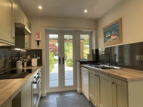 French doors open out to the patio and beautiful garden