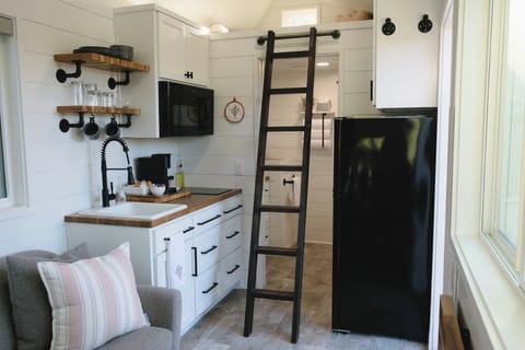 Climb the ladder up to a bonus room... the reading loft.