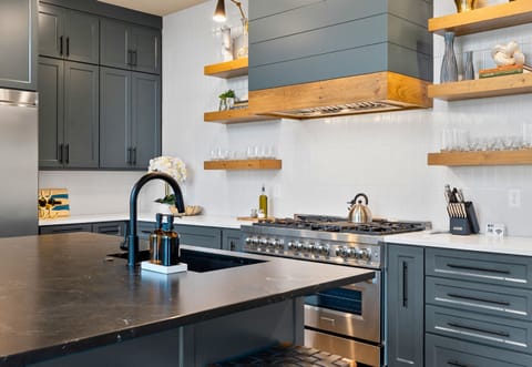 Step into our modern and fully-equipped kitchen, designed for both culinary enthusiasts and casual cooks alike.