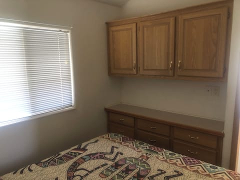 1 bedroom, desk, bed sheets