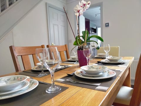 Dine in style perfect for intimate family or group meals w/ easy access kitchen.