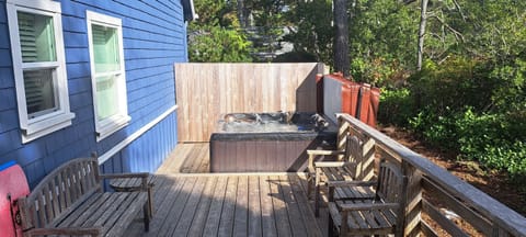 Enjoy a large hot tub ~ perfect for relaxing after a day at the beach!