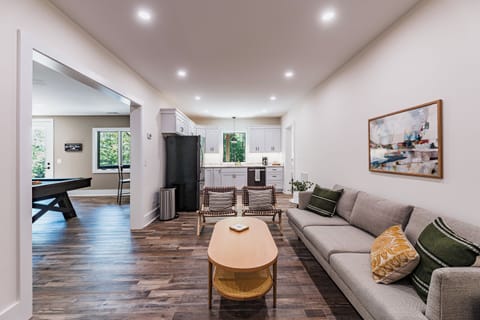 There is also a kitchen in the lower-level family room. It has another coffee maker, dishes for 8, and plastic cups to take to the hot tub or backyard.