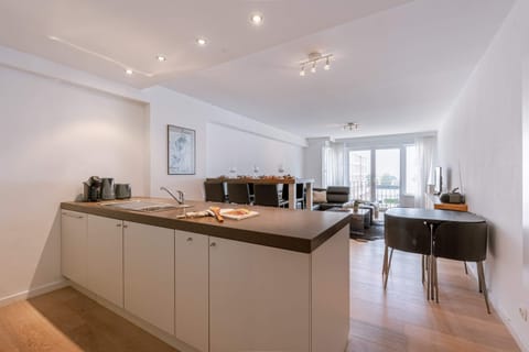 Open-concept layout from kitchen to living space - bright, spacious, and inviting.