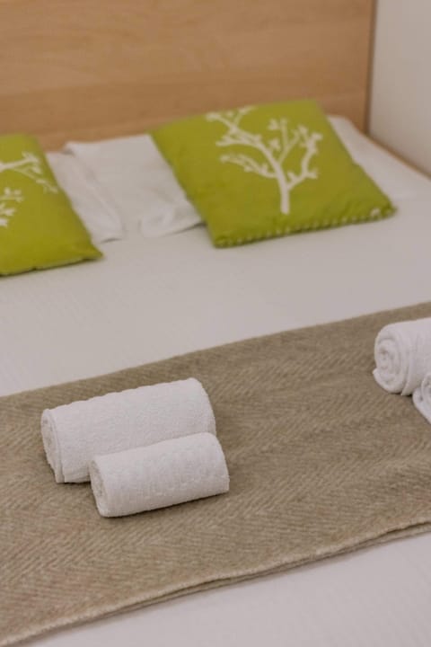 High-quality bedding and towels await for a comfortable, hotel-like experience.