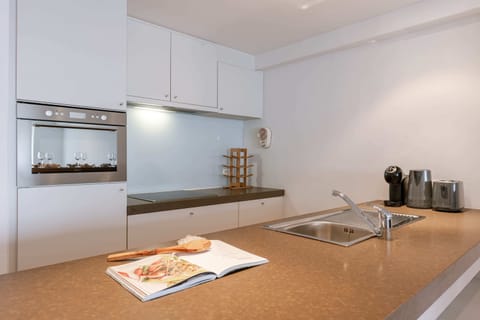 Enjoy preparing meals in this modern kitchen with all the essentials.