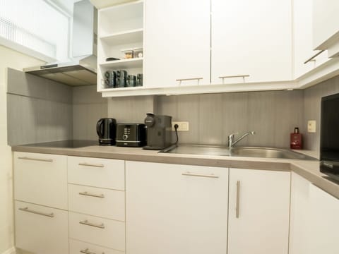 Cabinetry, Kitchen Sink, Property, Countertop, Sink, Kitchen, Kitchen Appliance, Home Appliance, Kitchen Stove, Interior Design